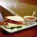 The Big Salad classic Italian sandwich is made with capicola, ham, salami, provolone and mozzarella cheese topped with red peppers, tomatoes, banana peppers, and an Italian vinaigrette served with tomato basil bisque on Friday, July 5. Daniel Brenner I AnnArbor.com